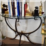 F05. Arca Consult glass and iron demilune table 30”h x 38”w x 17”d 
